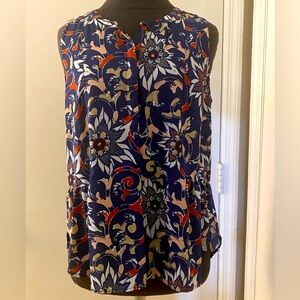 Loft floral pattern sleeveless button up top. Navy/rust/mustard/white. Size M